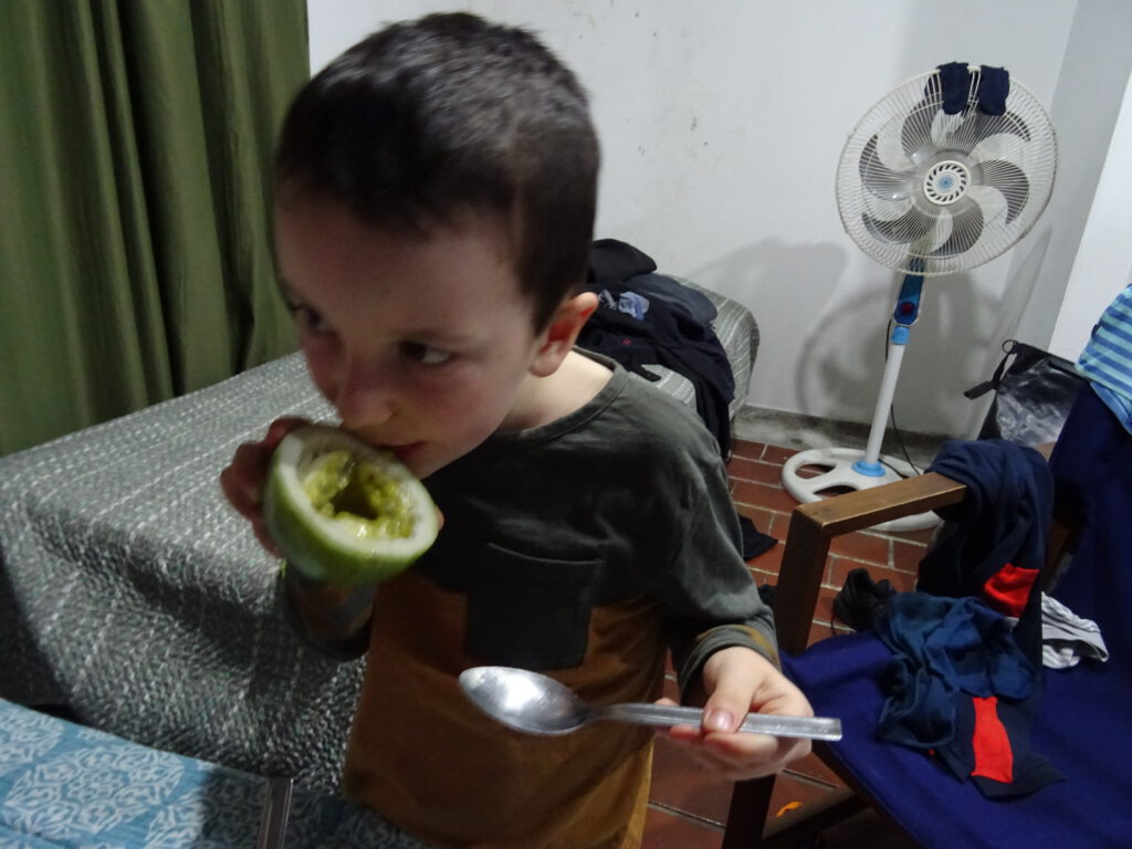 Simon eats a maracuya