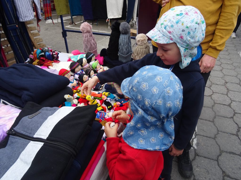Picking a wool puppet in Otavalo