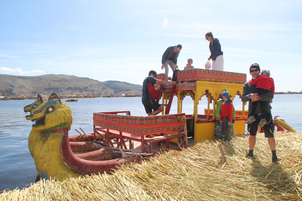 Boarding a totora boat