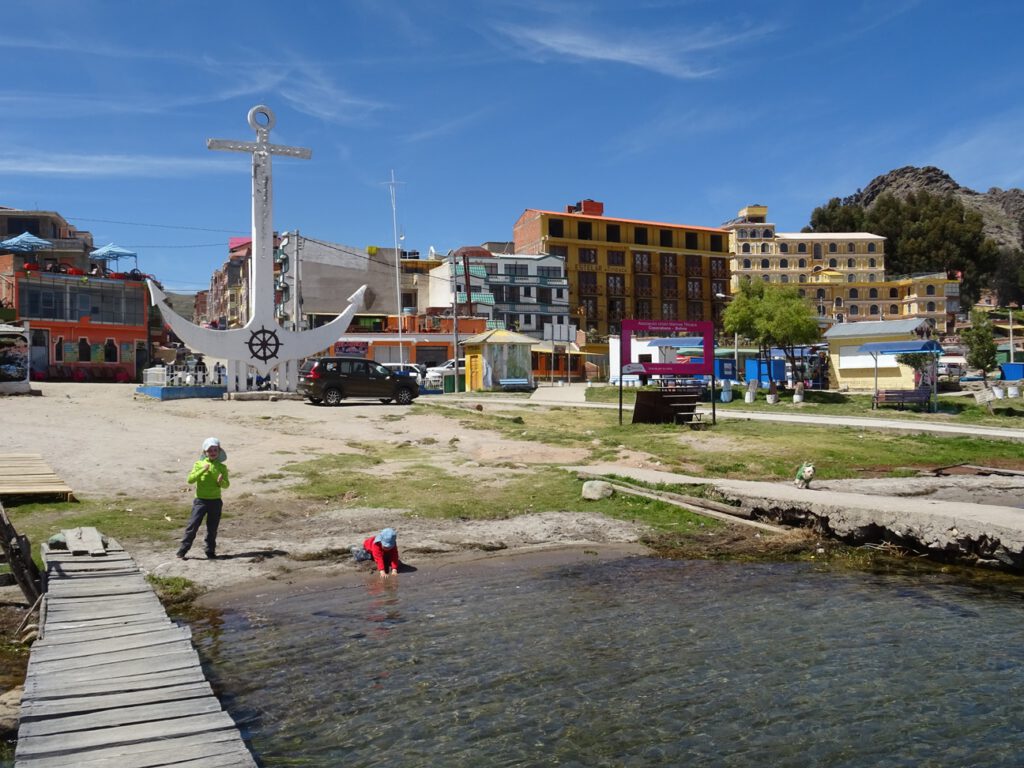 Playing in the Titicaca shore